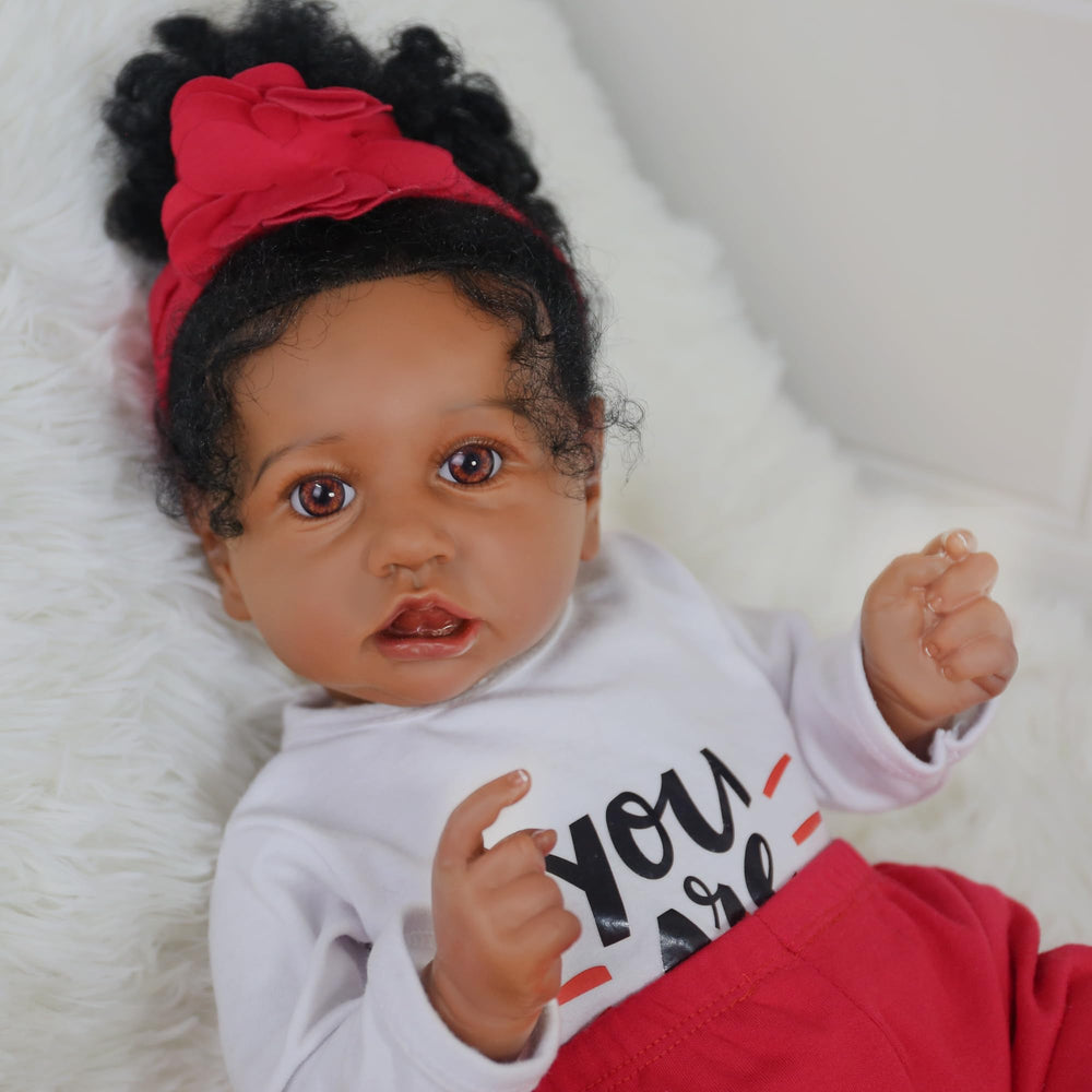 KSBD Reborn doll soft weighted body offers authentic cuddle feel.