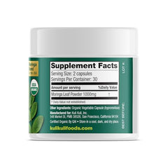 Closeup of moringa leaf powder used in Kuli Kuli capsules.