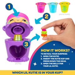 Kutie Kups insert-and-press reveal mechanism showing hidden Lil Kuties.