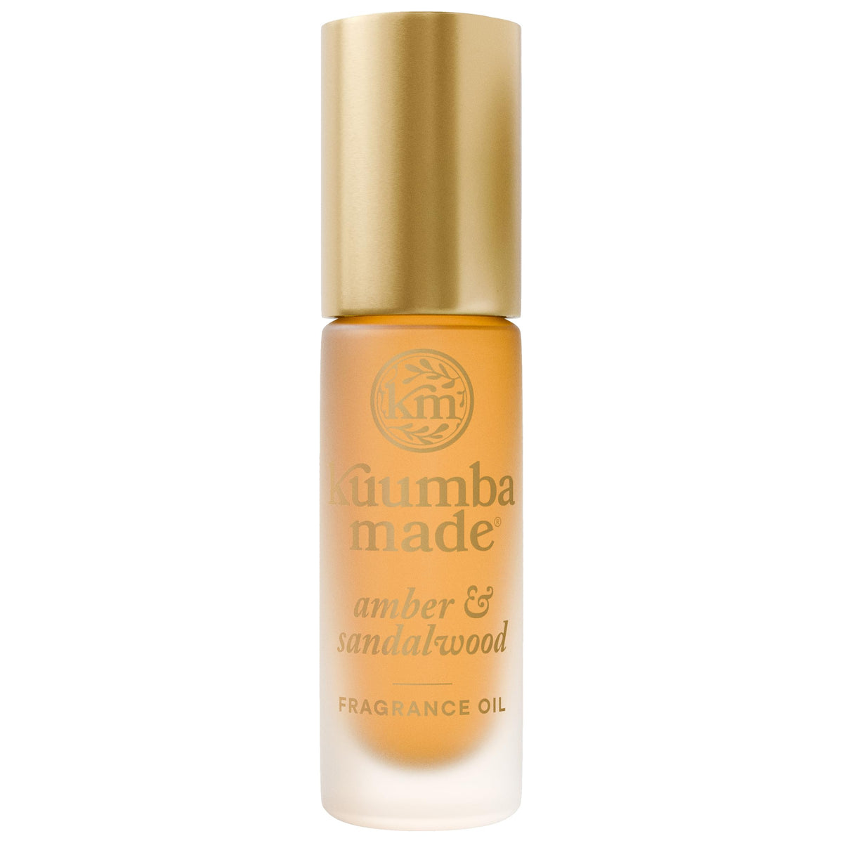 Kuumba Made Amber & Sandalwood bottle close-up for everyday luxury.