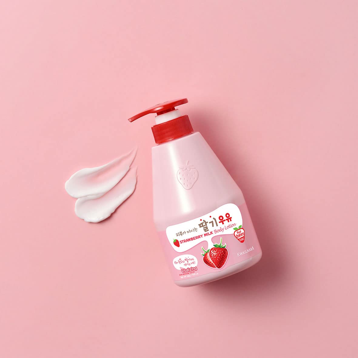 Kwailnara Strawberry Milk Lotion being applied to skin with fast absorption