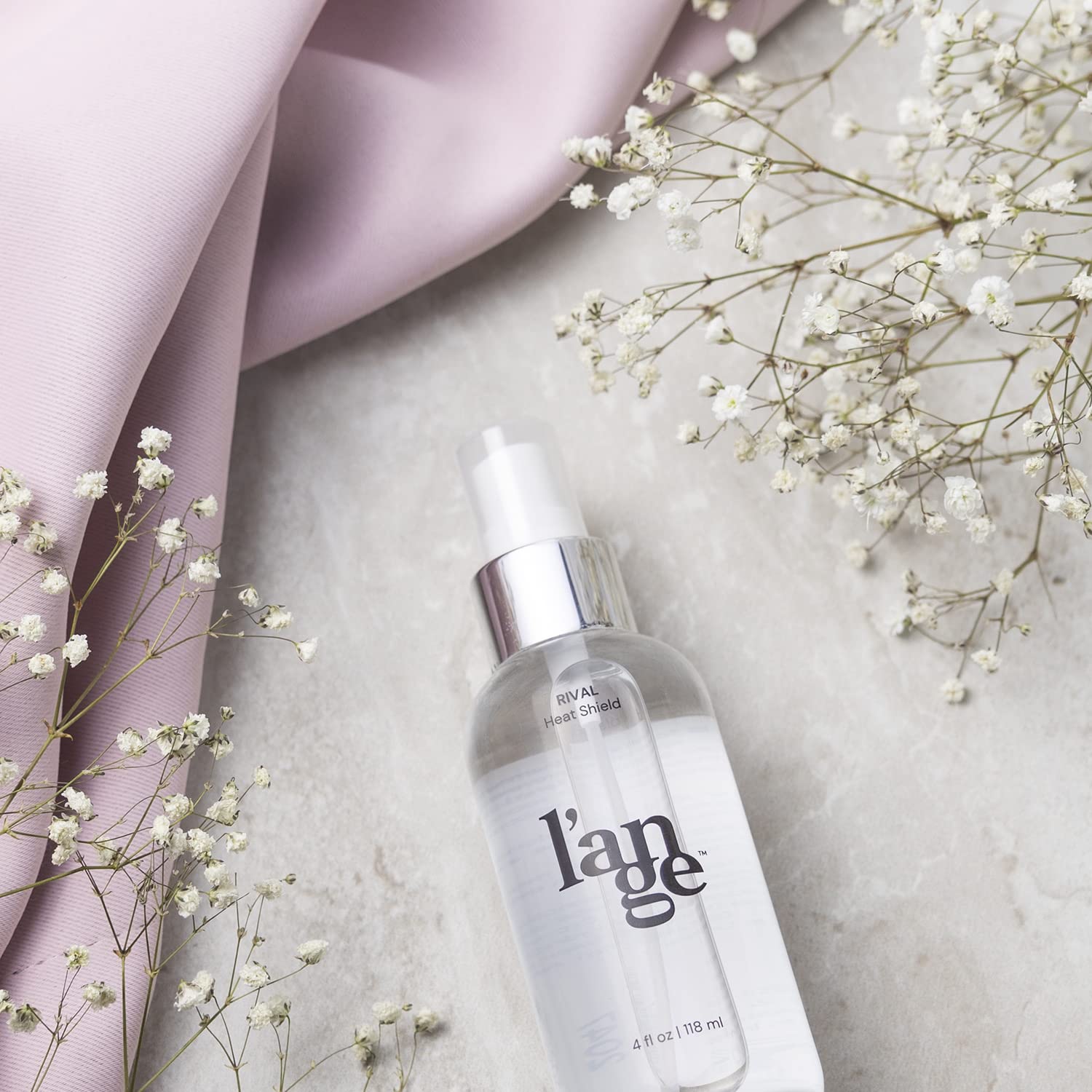 L'ANGE HAIR Rival Heat Shield delivers radiant shine without heaviness.