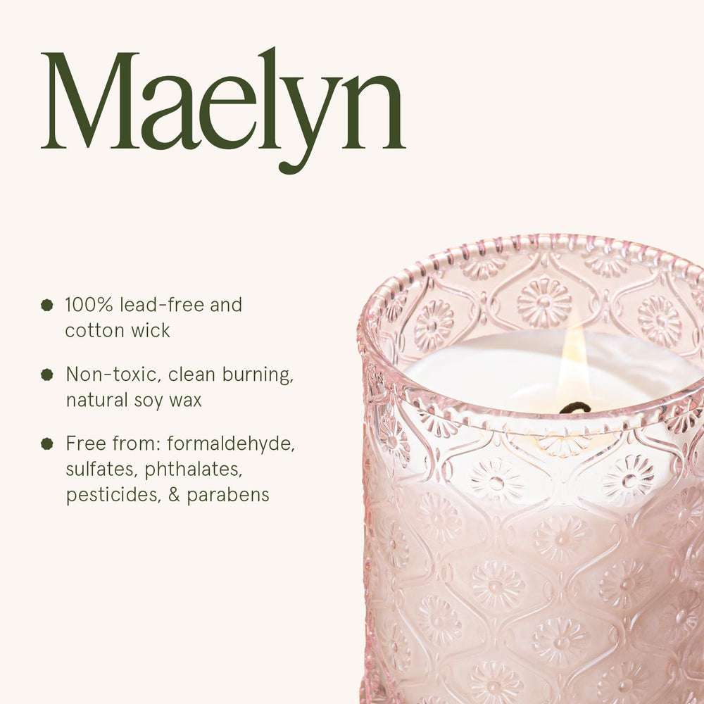 LA JOLIE MUSE Santal Rose candle in embossed glass jar adds refined style to any room.