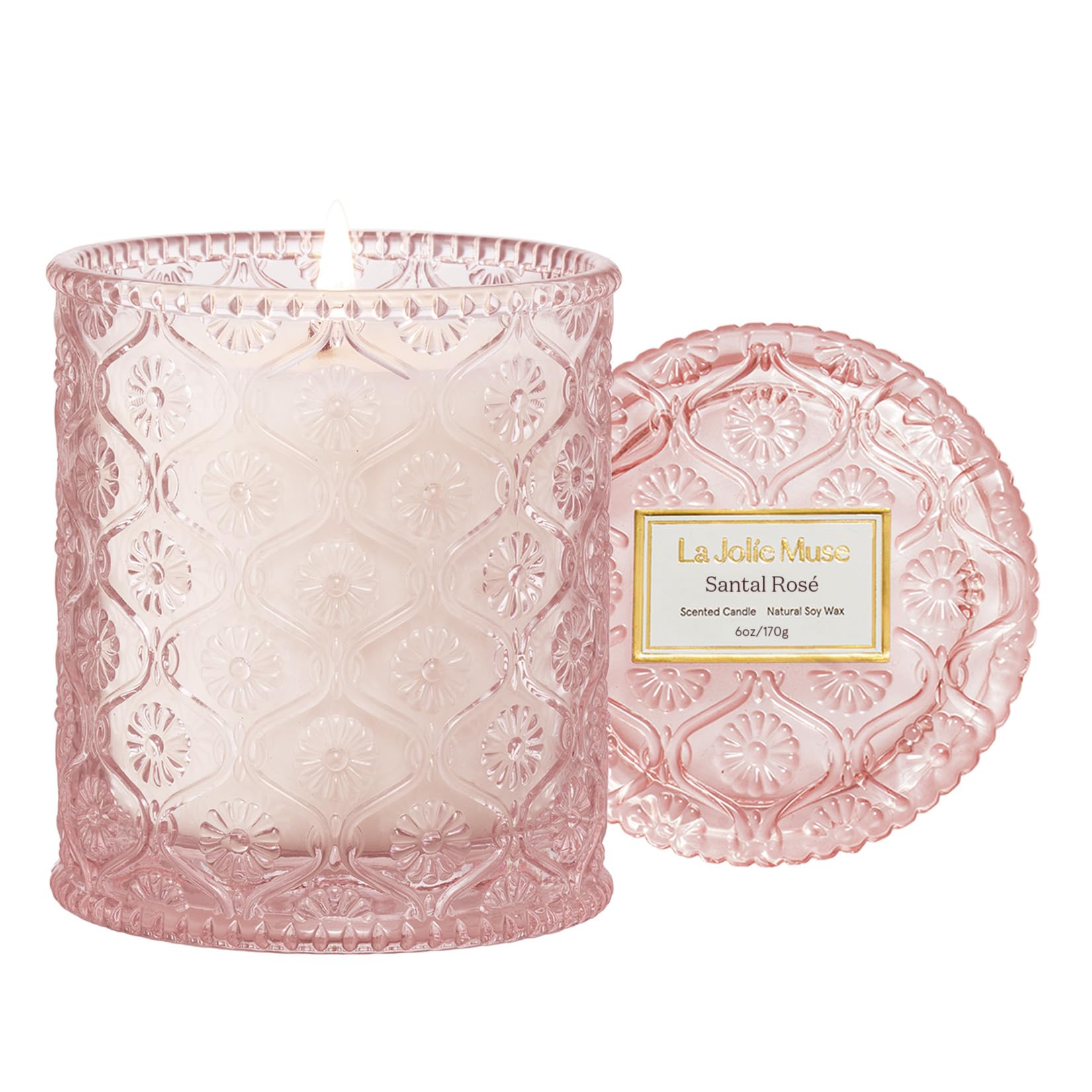 LA JOLIE MUSE Santal Rose candle jar with daisy embossing enhances decor and ambiance.