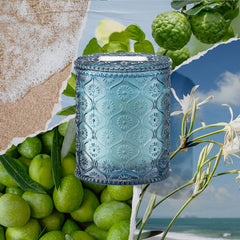 LA JOLIE MUSE Santorini Salt Air candle embossed daisy motif elevates décor subtly.