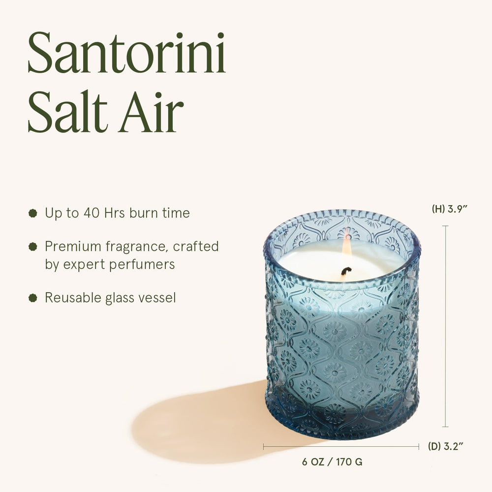 LA JOLIE MUSE Santorini Salt Air candle in-room ambience adds coastal freshness.