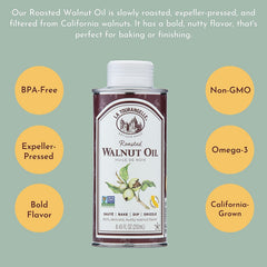 La Tourangelle Roasted Walnut Oil in a glass bottle reflecting amber hue.