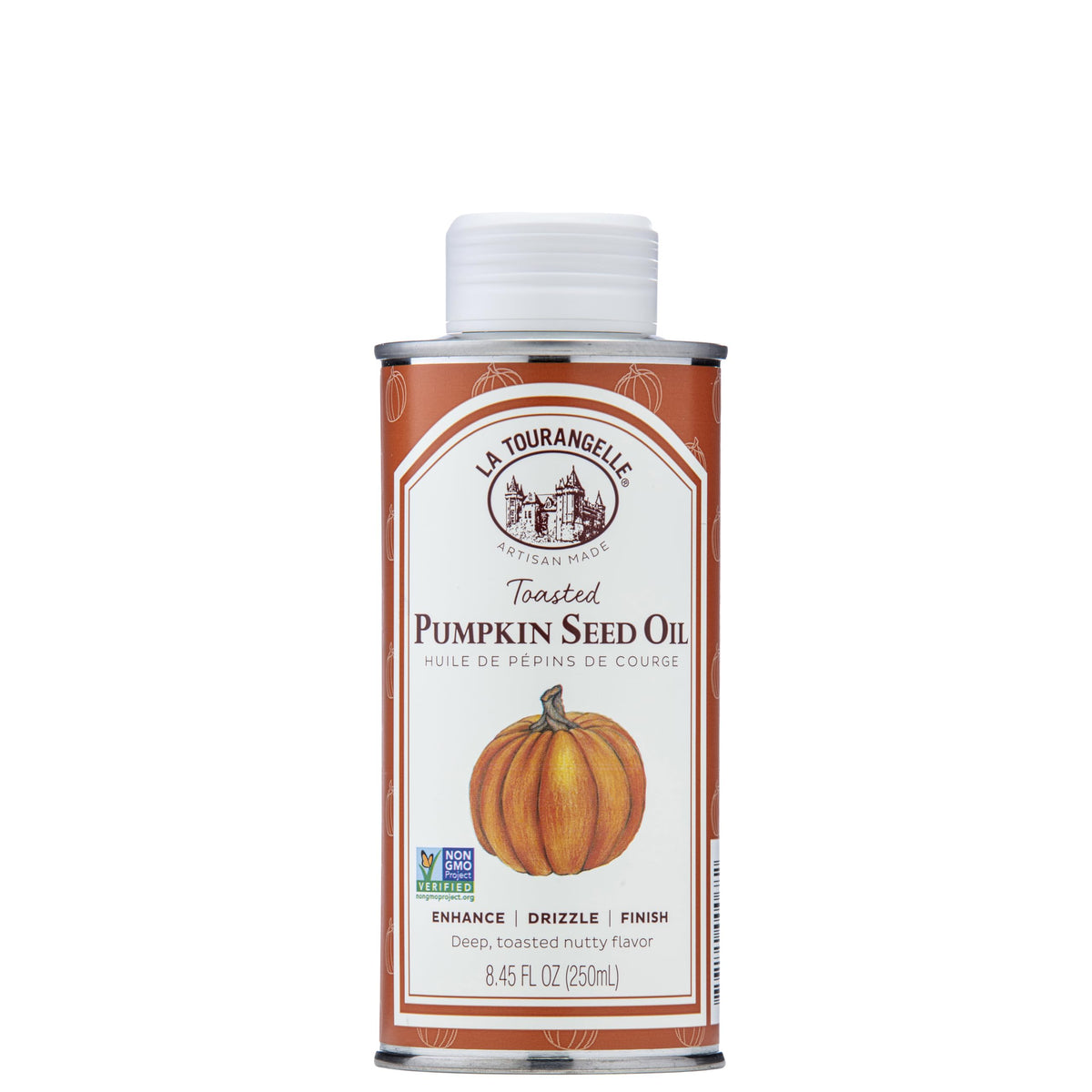 La Tourangelle Toasted Pumpkin Seed Oil bottle being poured over salad for nutty flavor