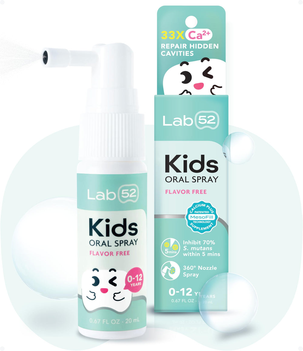 LAB52 Kids Oral Spray bottle beside a bed for easy bedtime care.