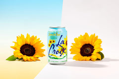 La Croix Sunshine glass pour with bubbles capturing vibrant flavor.