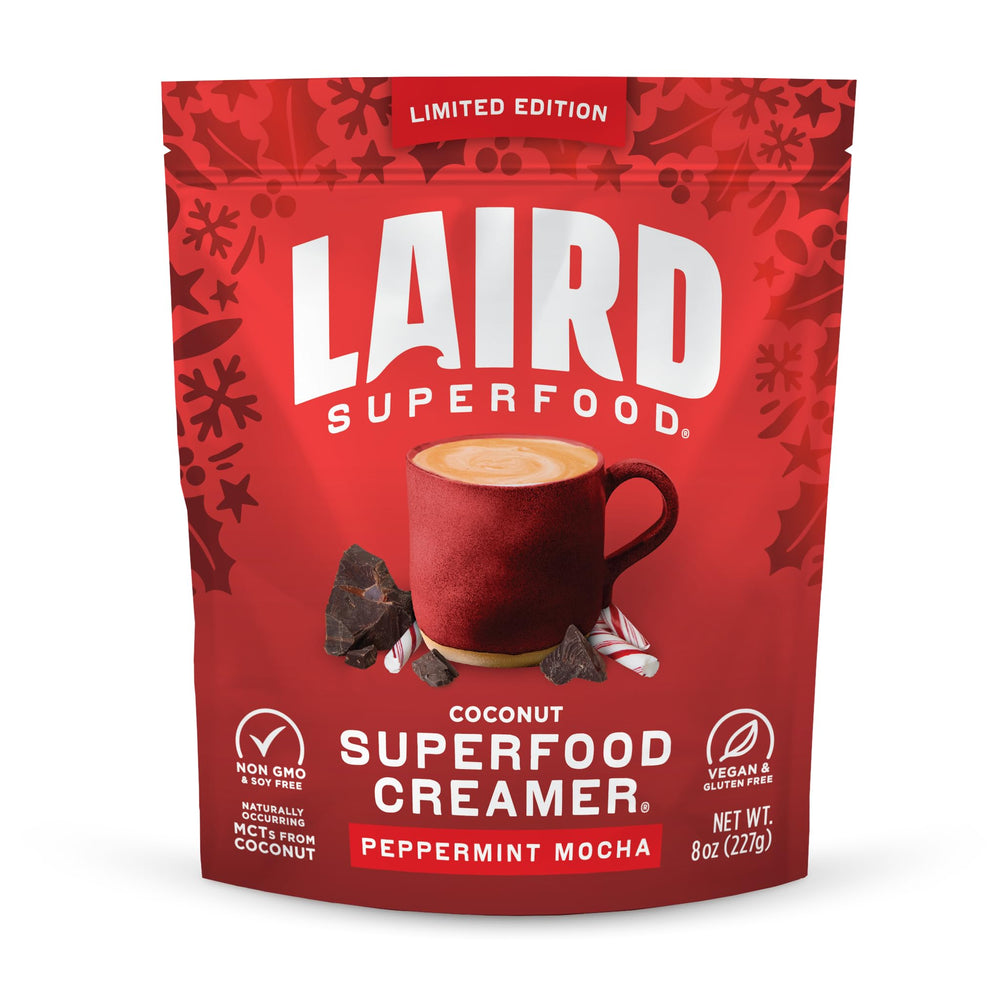 Laird Superfood Peppermint Mocha creamer powder being poured into hot coffee for a creamy minty boost
