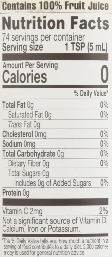 Fresh citrus slice beside Lakewood Lemon Pure Organic juice suggests vibrant flavor.