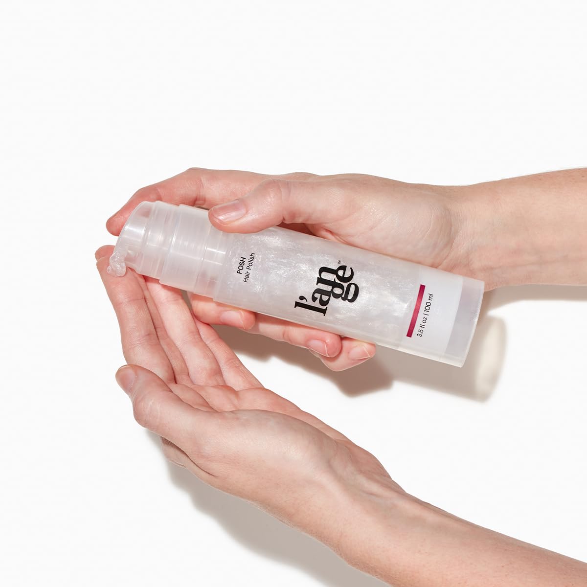 L'ANGE HAIR Posh Hair Polish applied on hair during styling to reduce frizz.