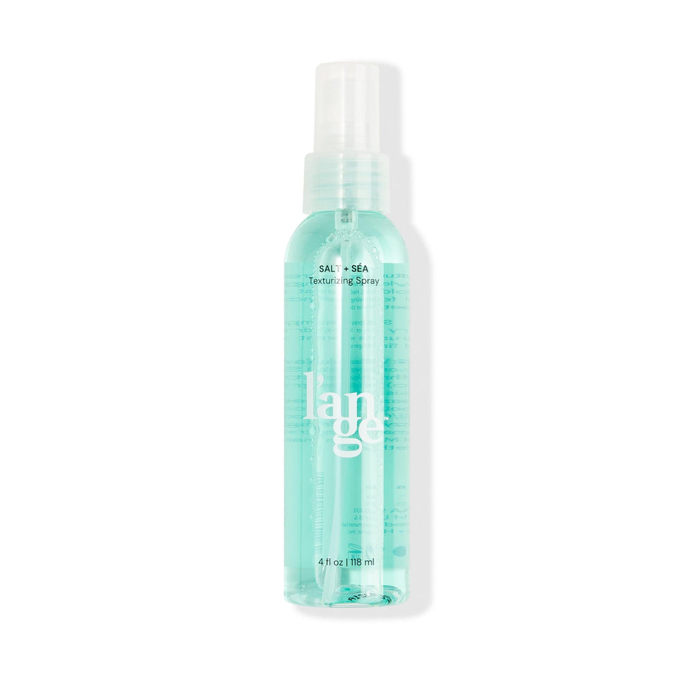 LANGE HAIR Sea Salt Texturizing Spray bottle shows light hold and airy texture.