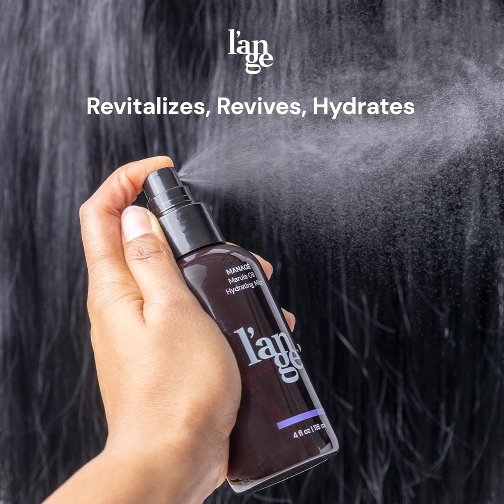L'ANGE HAIR Marula Oil Hydrating Mist spray nozzle in use for quick refresh.