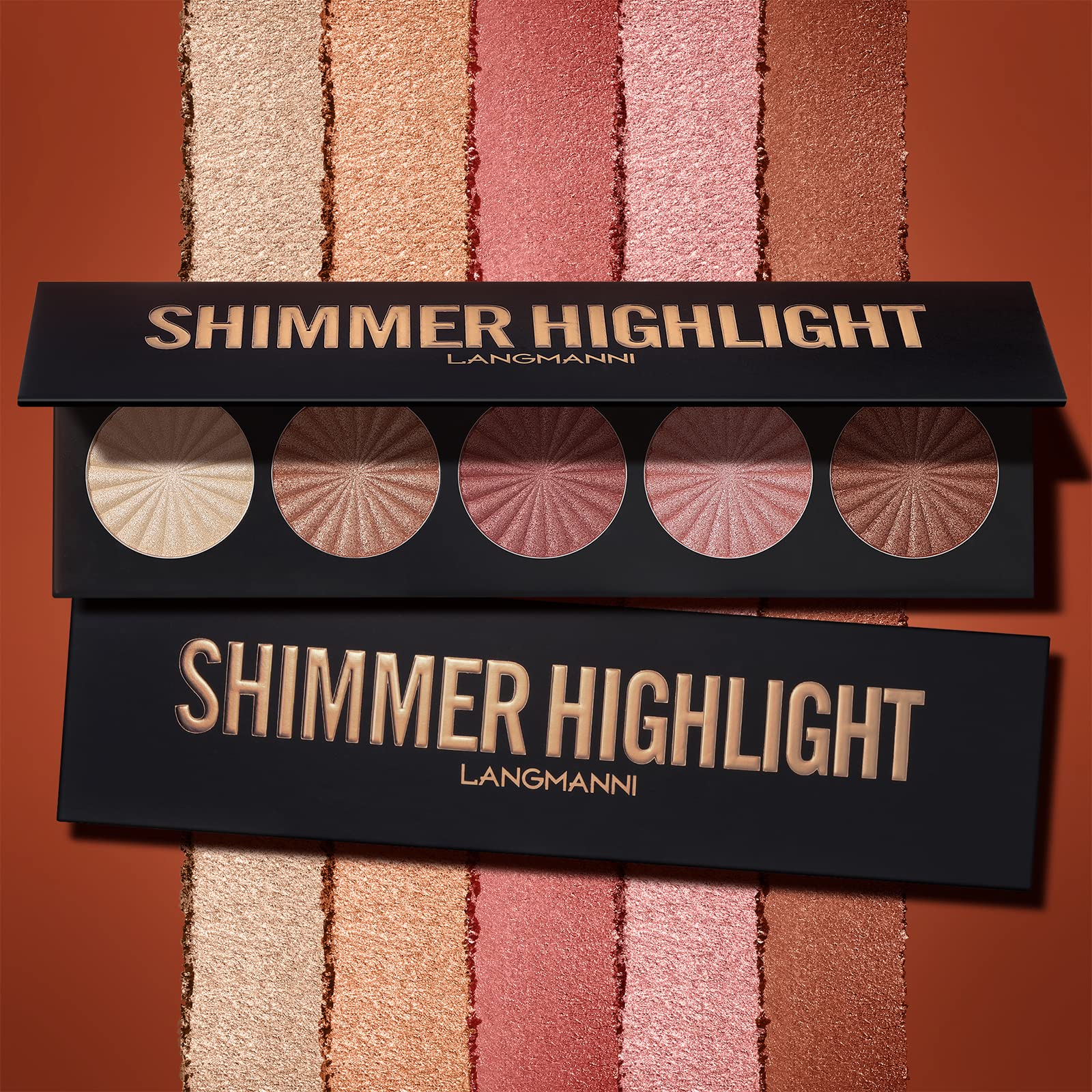 Langmanni highlighter on lips creates a luminous finish.