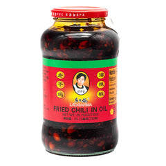 Lao Gan Ma fried chili in oil jar close-up showing crunchy flakes for bold noodles and stir-fries