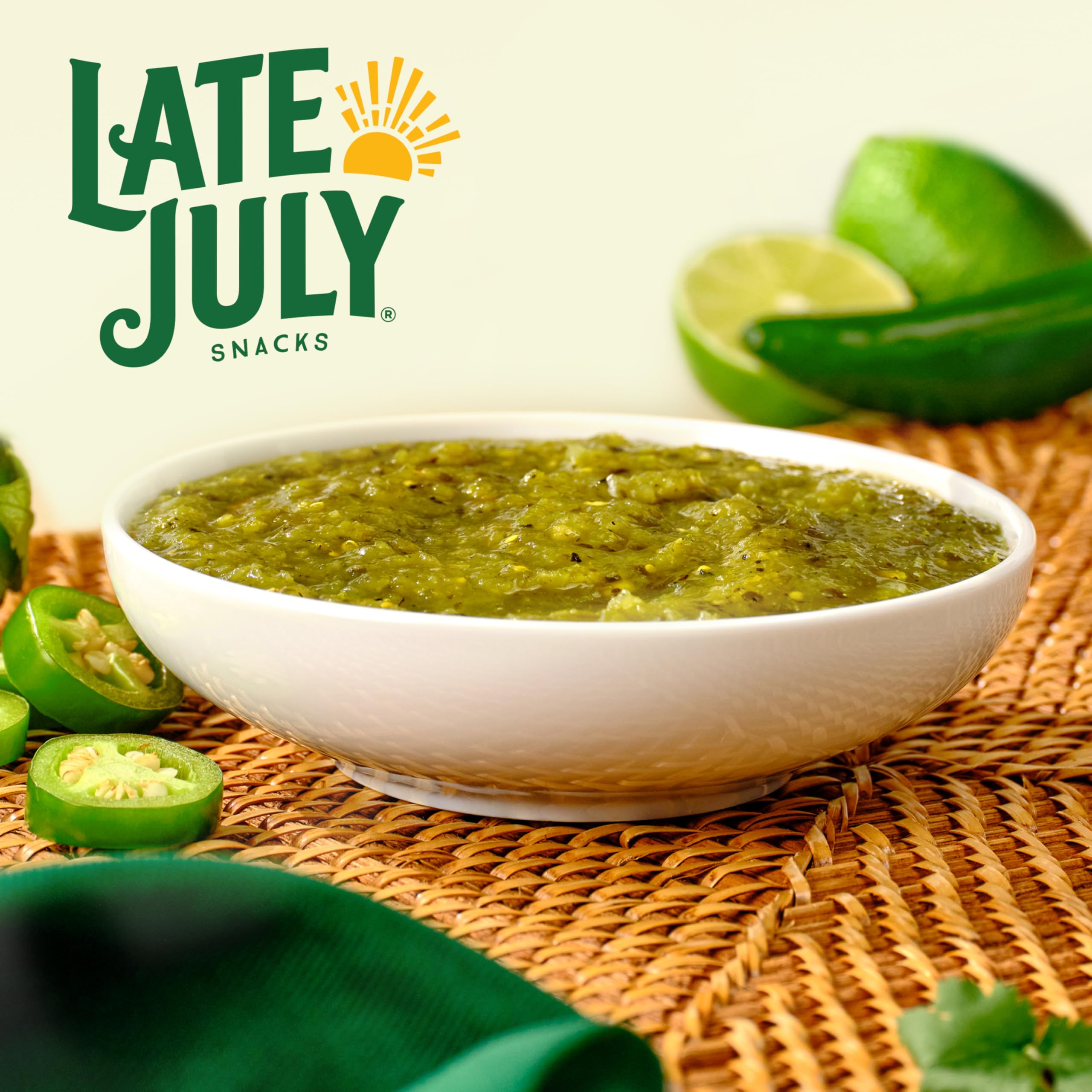 Late July Salsa Verde nachos plate with vibrant green topping.