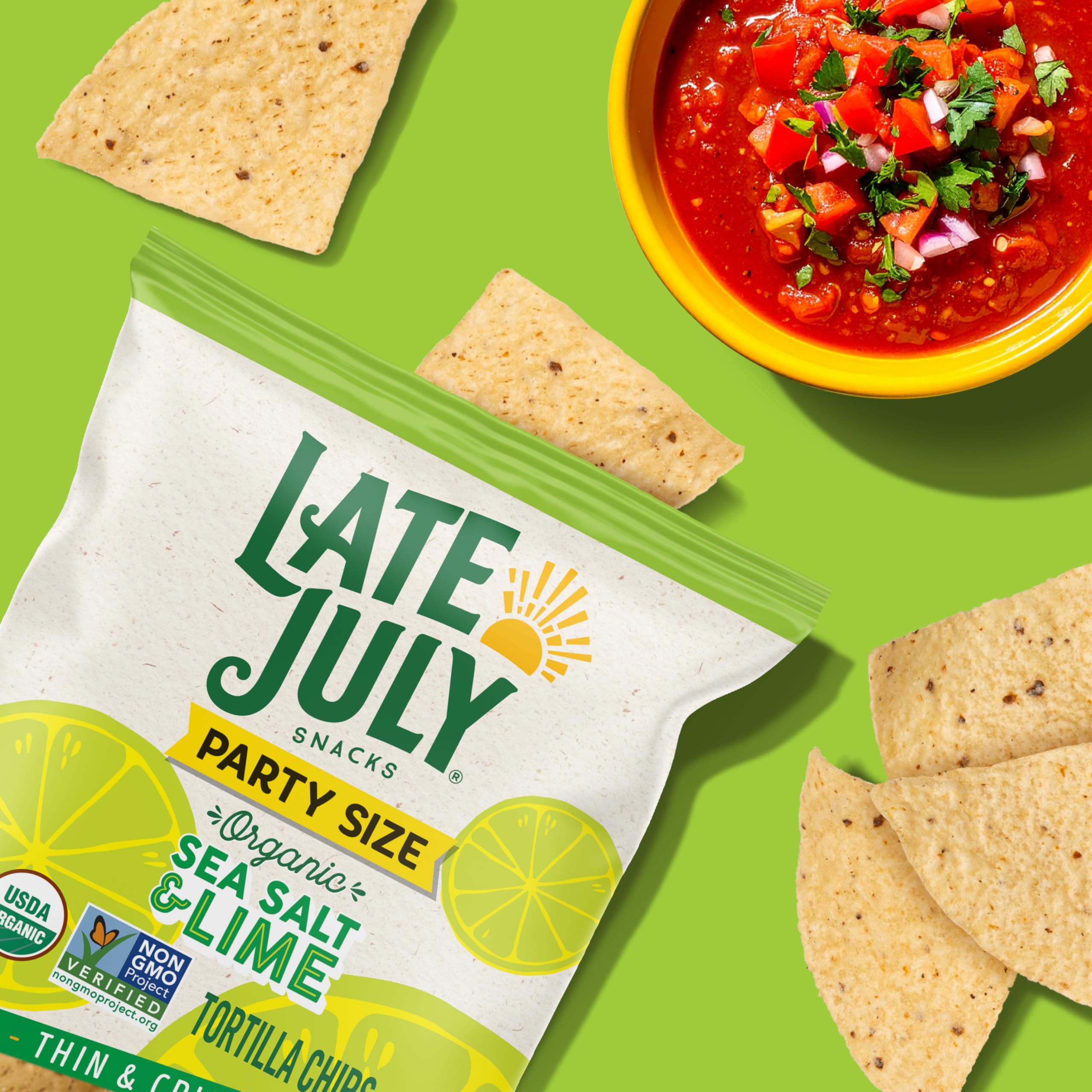 Late July Sea Salt and Lime chips with lime slices for refreshing flavor