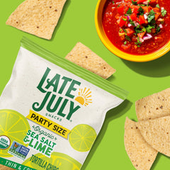 Late July Sea Salt and Lime chips with lime slices for refreshing flavor