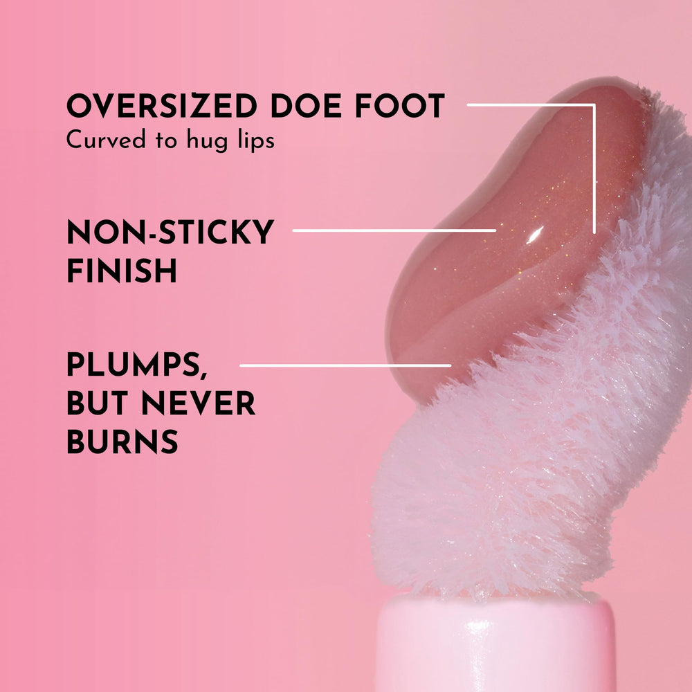 Lawless Forget The Filler Lip Plumper Nudie Pink swatch showing glassy shine and smooth lip lines.