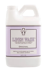 Le Blanc Original Linen Wash bottle pour demonstrates cold-water stain removal.