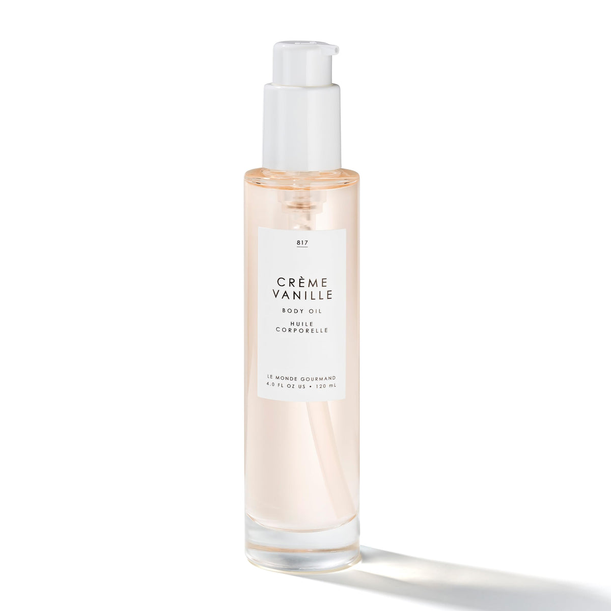 Le Monde Gourmand Crème Vanille Body Oil bottle pour promotes quick absorption on skin.