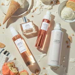 Le Monde Gourmand Crème Vanille Body Oil in shower scene as gentle cleanser.