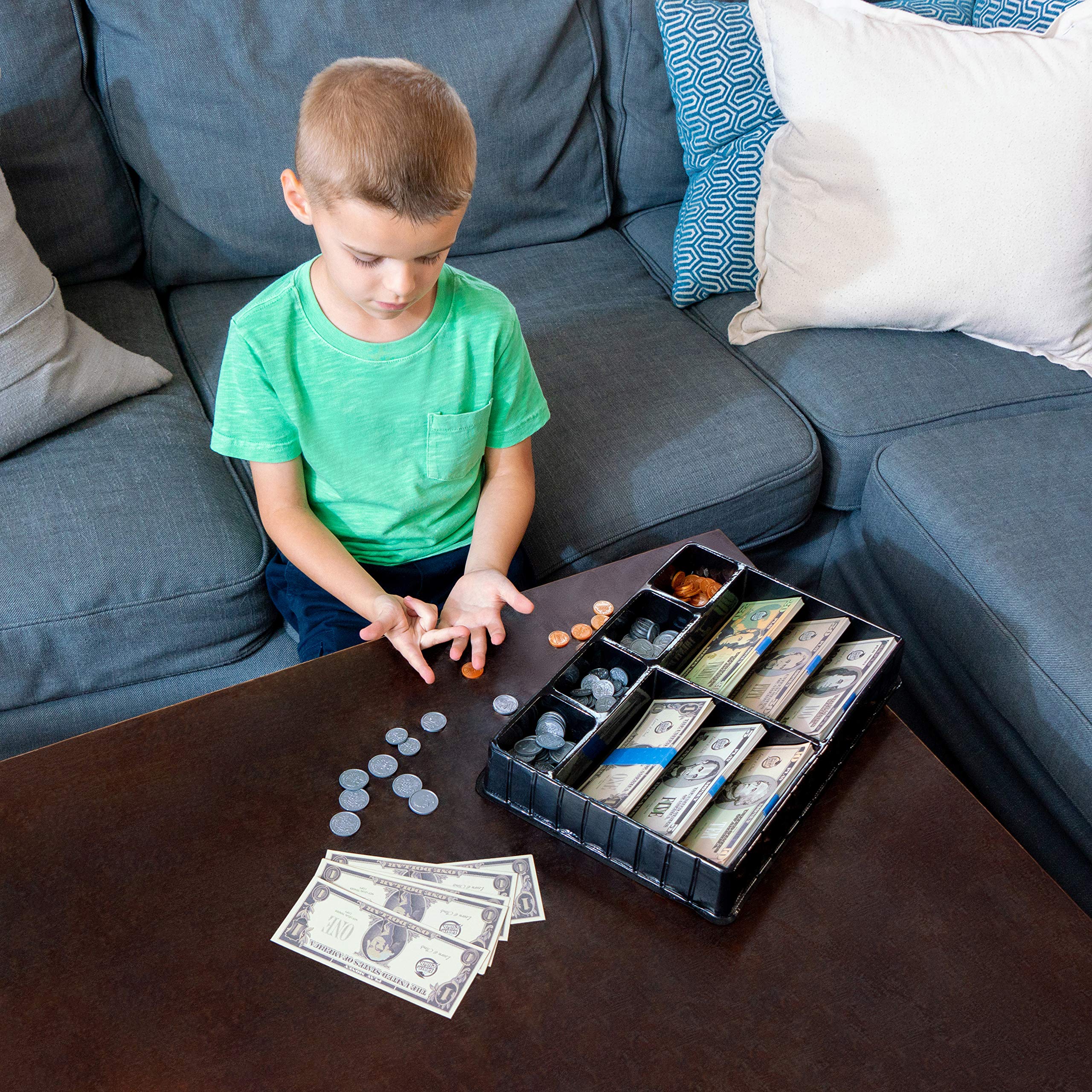 Learn & Climb Play Money debit card for pretend purchases and tracking.