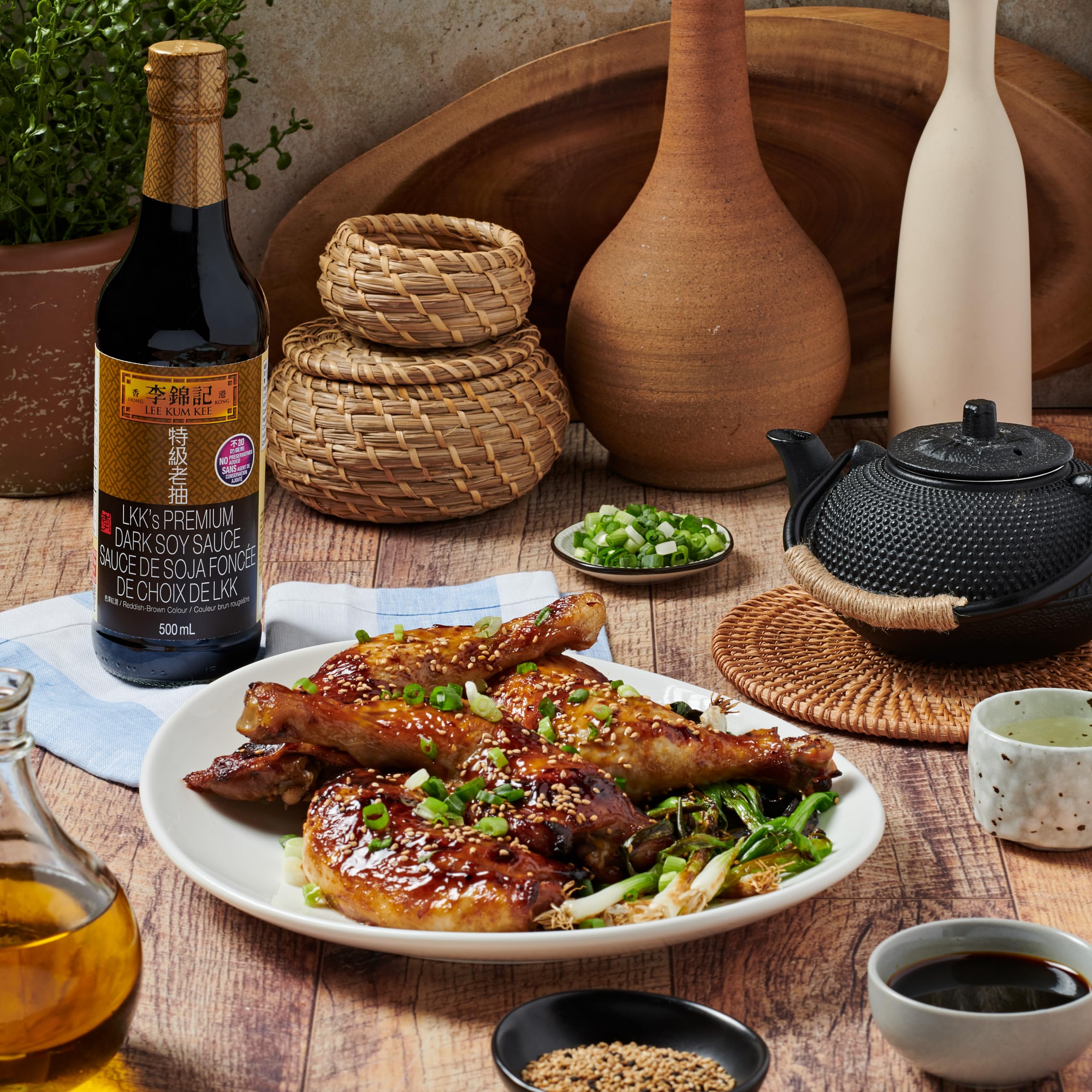 Lee Kum Kee Premium Dark Soy Sauce glossy finish enhances plated sauce.