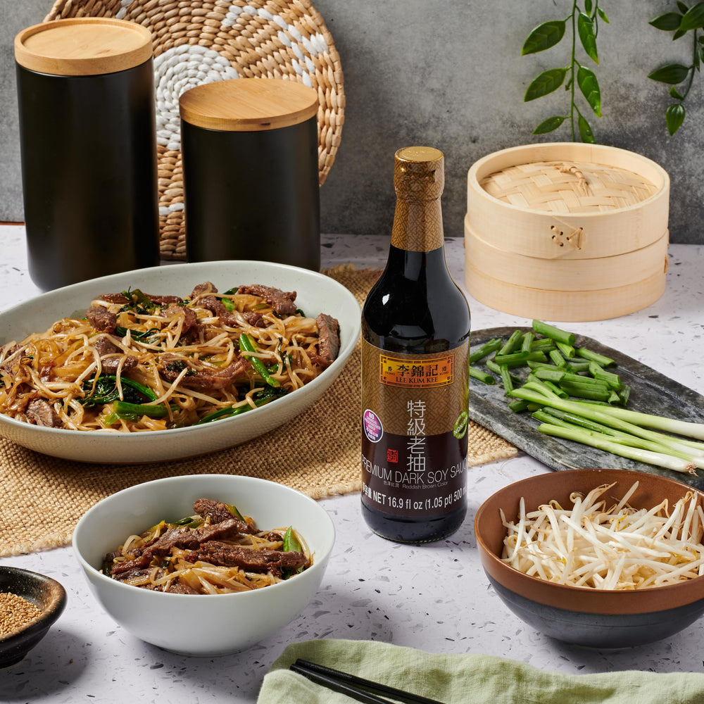 Lee Kum Kee Premium Dark Soy Sauce used for braising pork with depth.