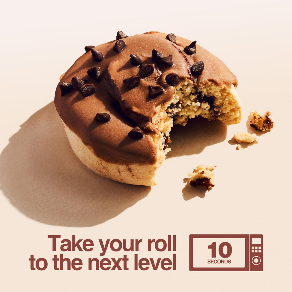 Legendary Foods Cinnamon Roll Bar unwrapped, ready for post-workout recovery