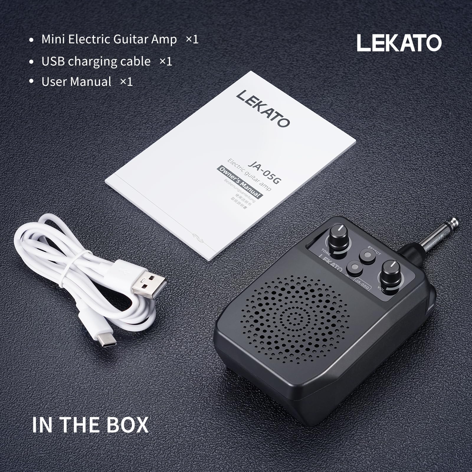 LEKATO mini amp in use with guitar during practice.