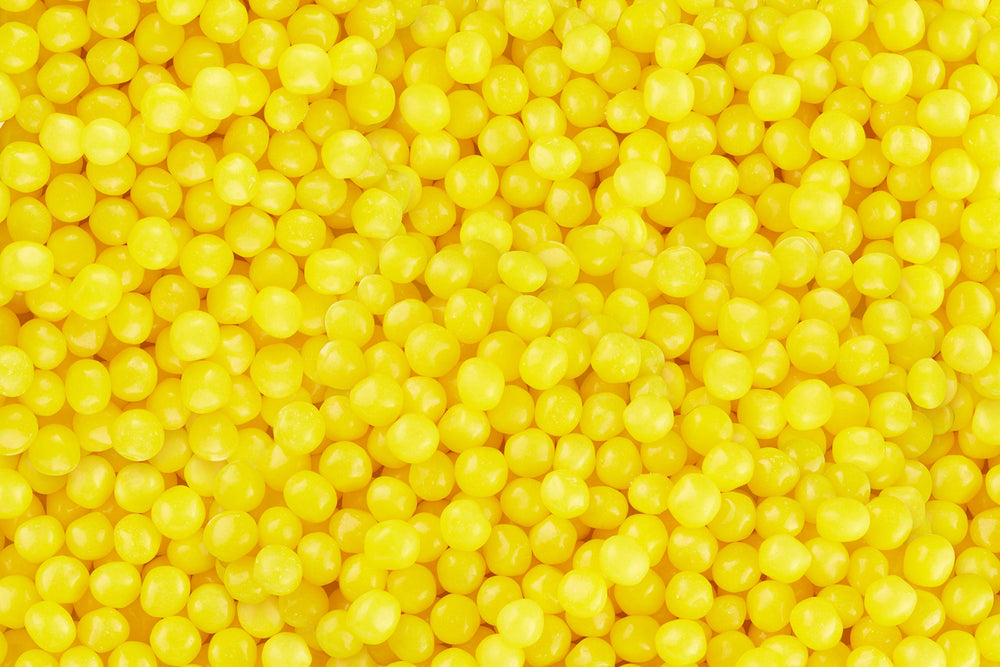 Opened theatre box with individual Lemonhead candies for sharing