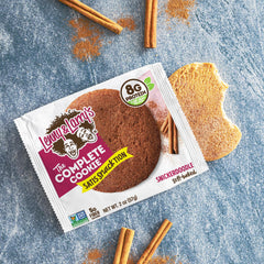 Close-up of Lenny & Larry's Snickerdoodle bite reveals chewy interior and cinnamon aroma