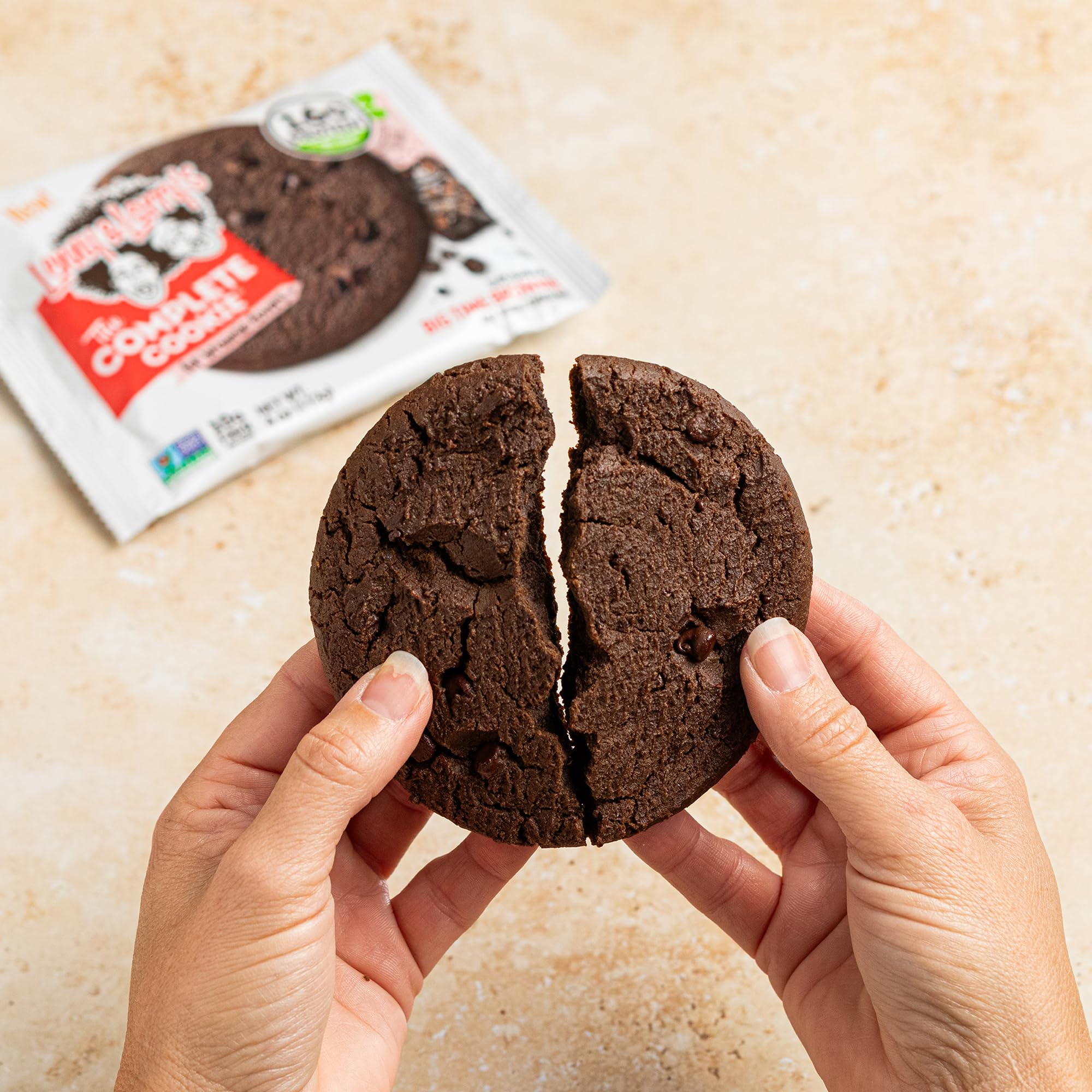 Store display of Lenny & Larry's Complete Protein Cookie Big Time Brownie pack