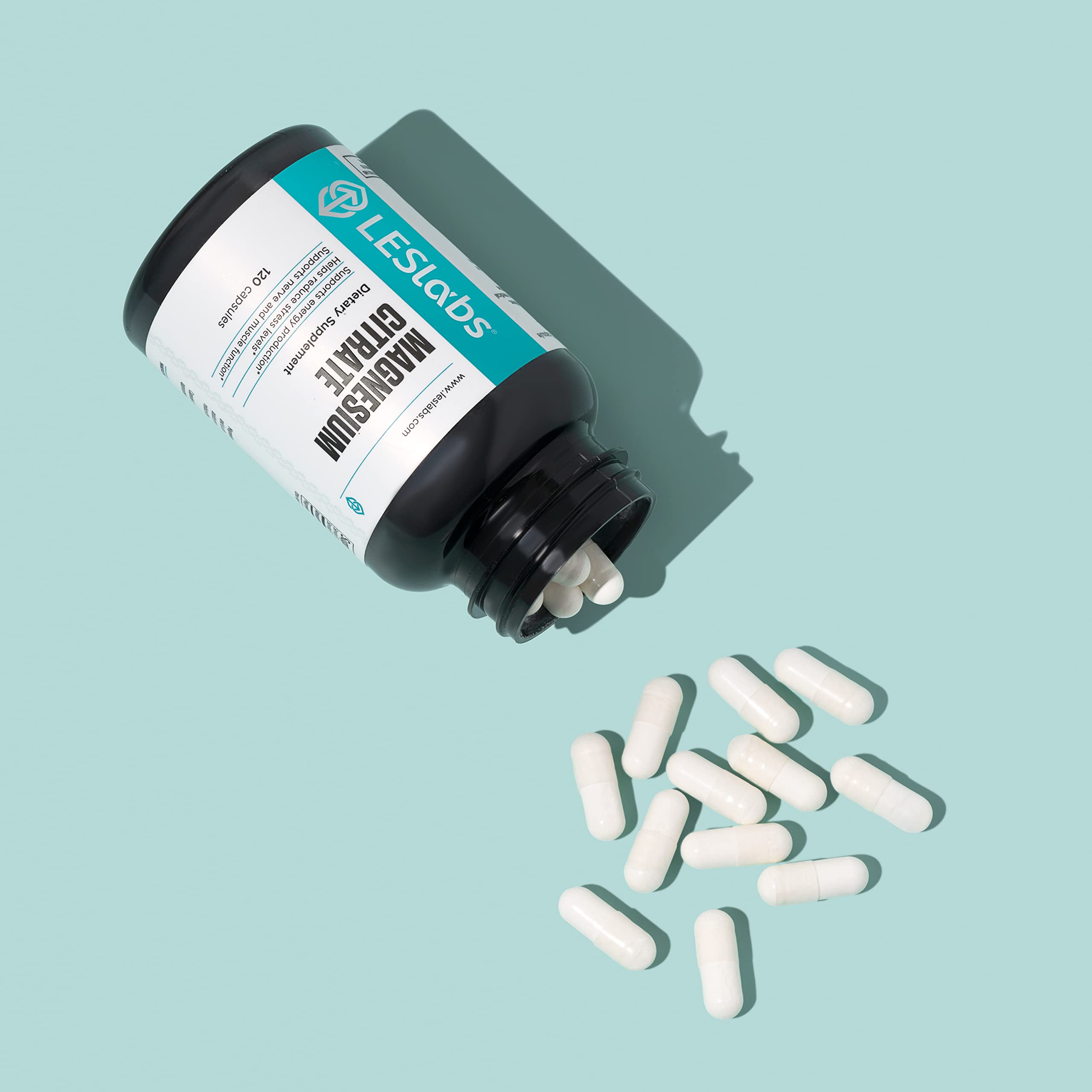 LES Labs Magnesium Citrate bottle on desk suggests stress relief and sleep support.