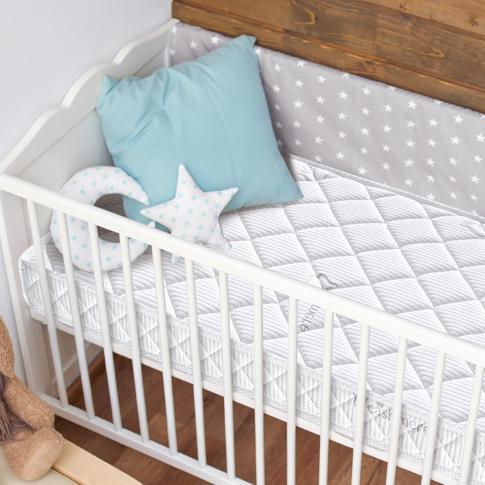 Letmxiu premium crib mattress seamless-fit demonstrates full coverage on standard cribs.