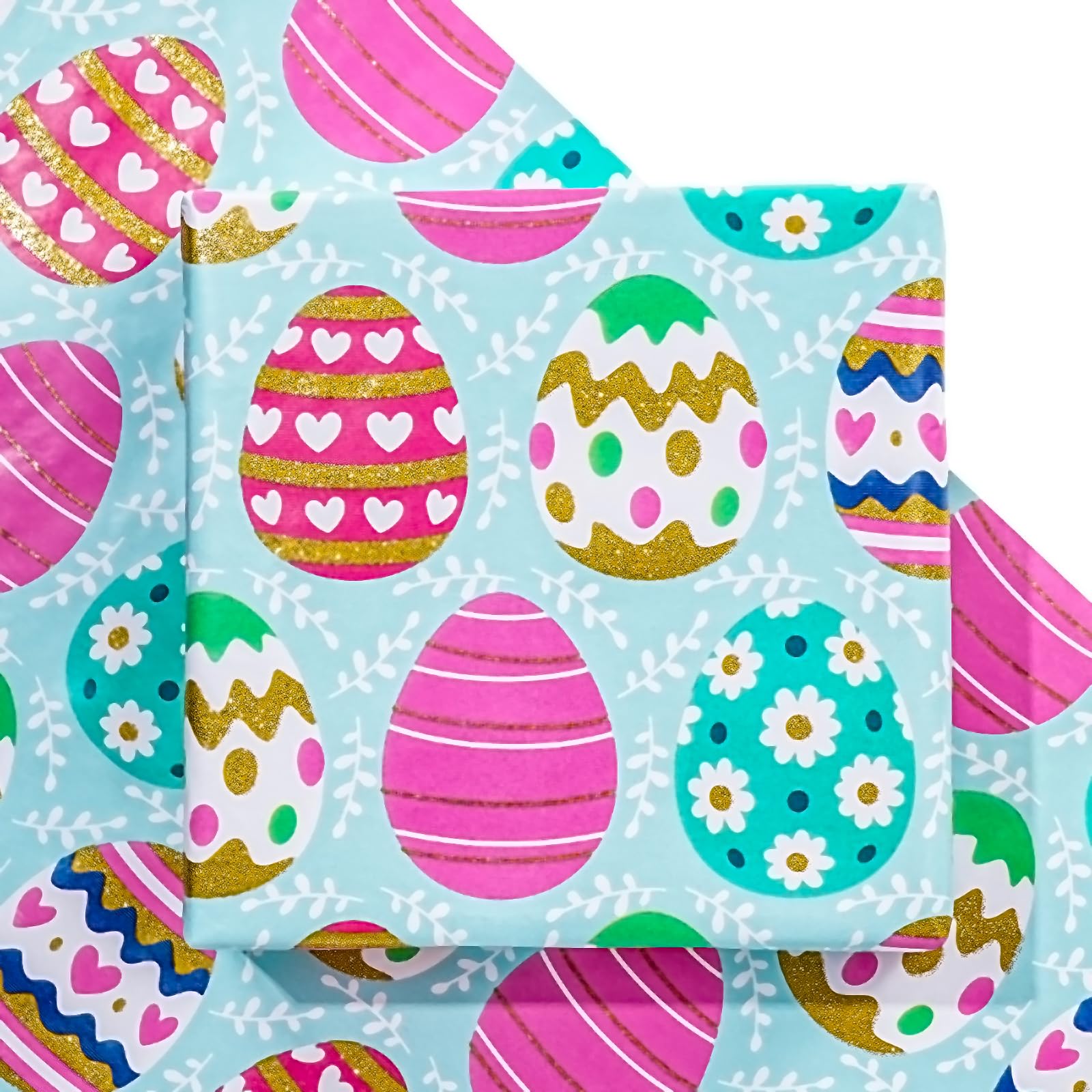 Glitter gold foil eggs add a luxurious sparkle to Easter gifts with LeZakaa wrap.