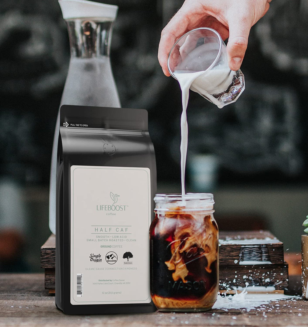 LIFEBOOST Half Caff coffee brewed in a mug emphasizes balanced flavor and aroma.