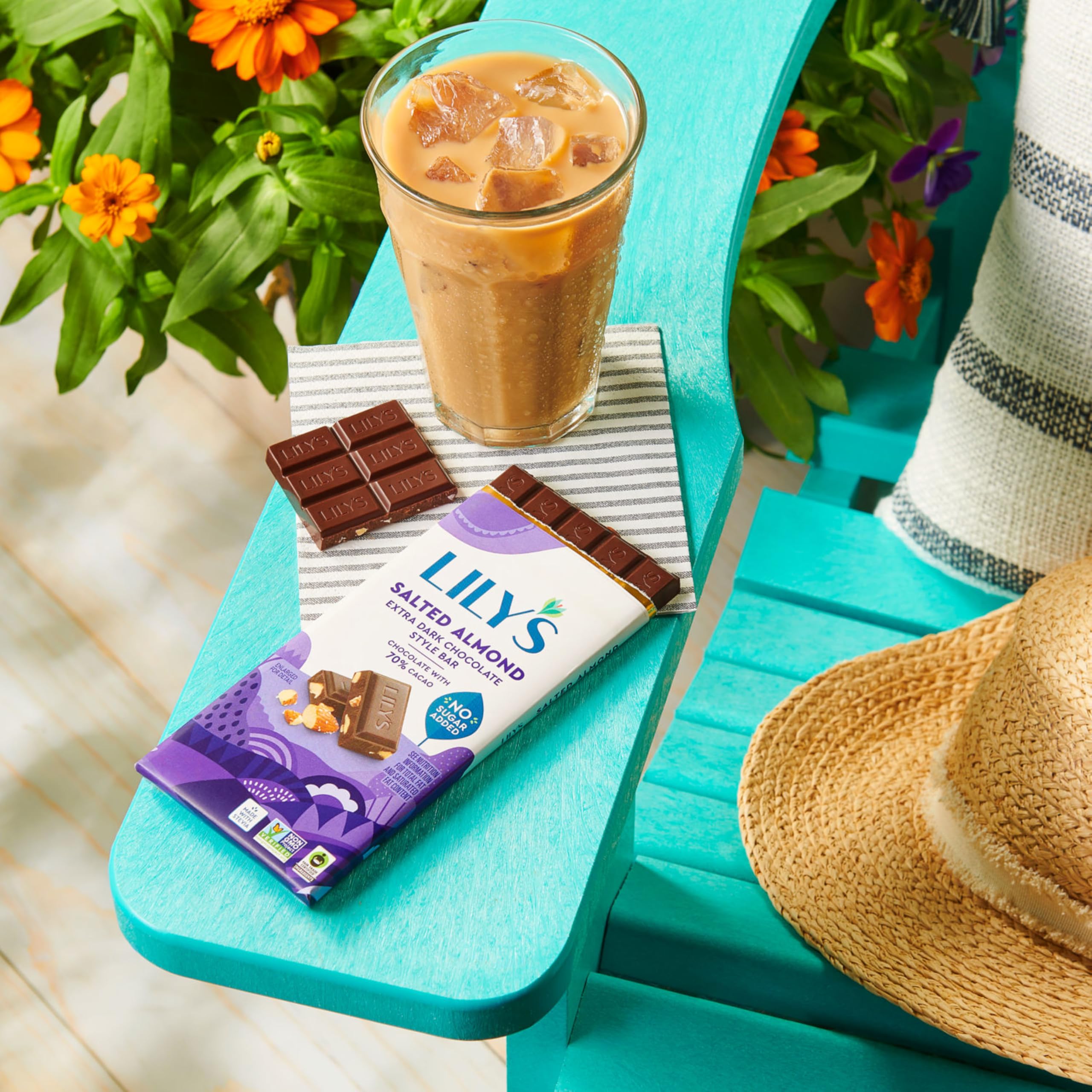 LILY'S Salted Almond Extra Dark Bar on a desk suggesting a mindful snack