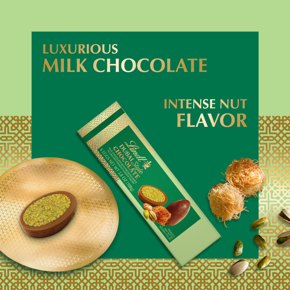 Lindt Dubai Style milk chocolate Easter egg cross-section reveals pistachio cream.