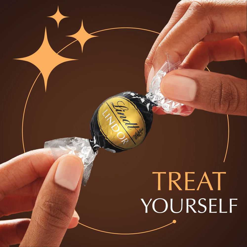 Lindt LINDOR 70% foil-wrapped truffles in a luxurious package