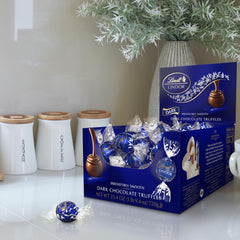 Lindt LINDOR dark chocolate truffles gift box on display for celebrations.