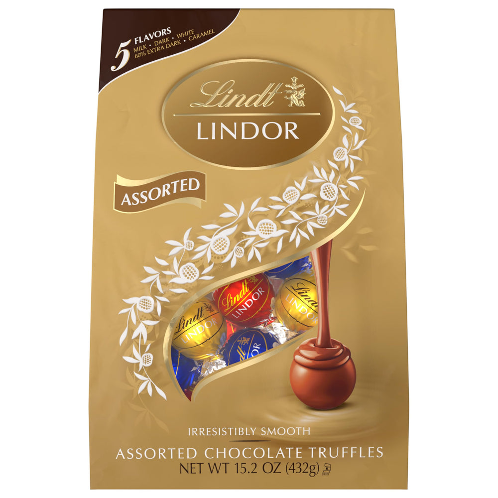 Lindt LINDOR 60% extra dark truffles closeup, bold flavor.