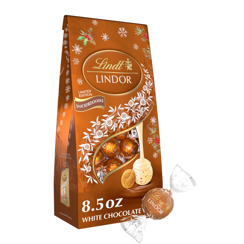 Lindt Lindor Snickerdoodle white chocolate truffles in an 8.5 oz bag, a festive gift option.
