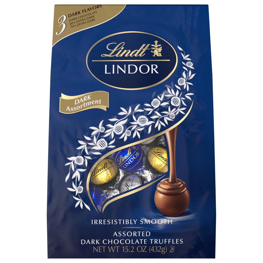 Master Chocolatiers crafting the melt-in-mouth Lindt truffles.
