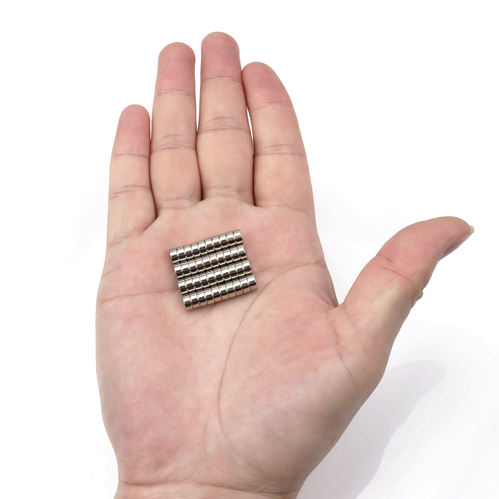 Linlinzz magnets appear with a silver finish on a whiteboard.