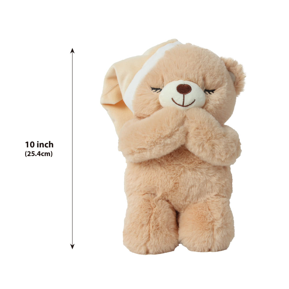 Linzy Prayer Bear pictured in a bedtime scene for nightly routines