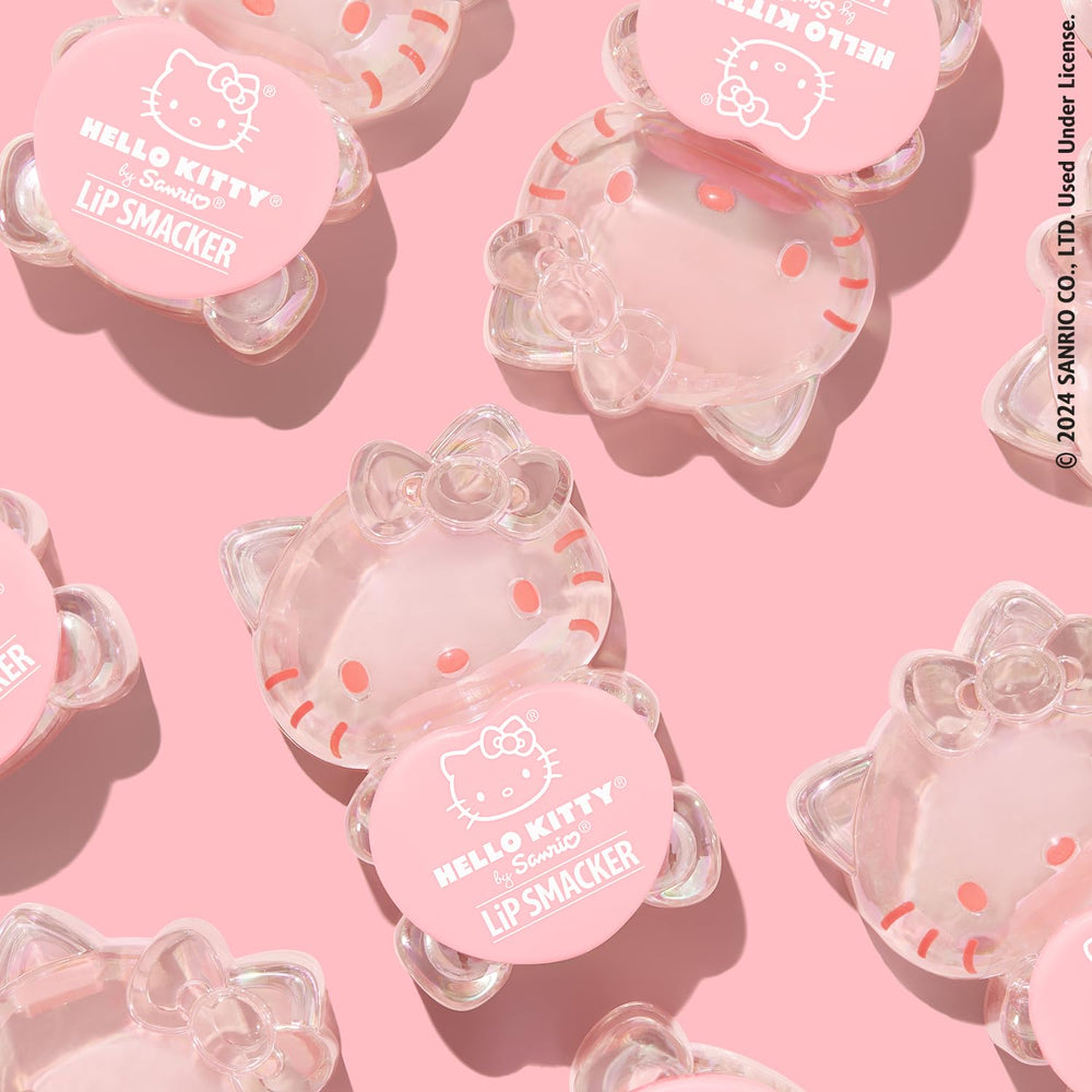 Lip Smacker Hello Kitty Peach Gummy lip balm on lips adds soft shine and moisture.